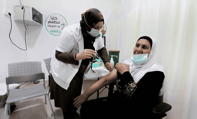 Arabs getting Covid-19 vaccine