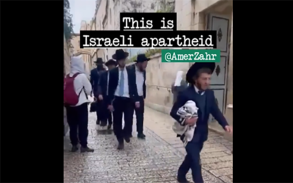 spitting Jews video