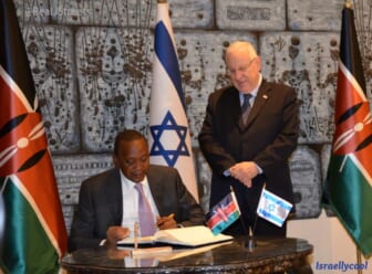 Kenyatta President of Kenya signs official Israeli guest book