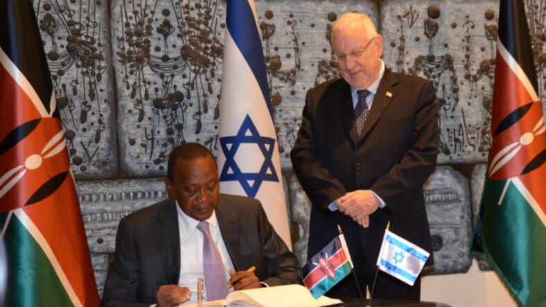 Kenyatta President of Kenya signs official Israeli guest book