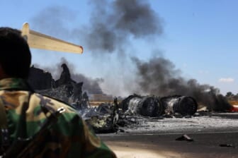 This is not Ben Gurion Airport. The remains of a burnt airplane is pictured at the Tripoli international airport in the Libyan capital on July 16, 2014