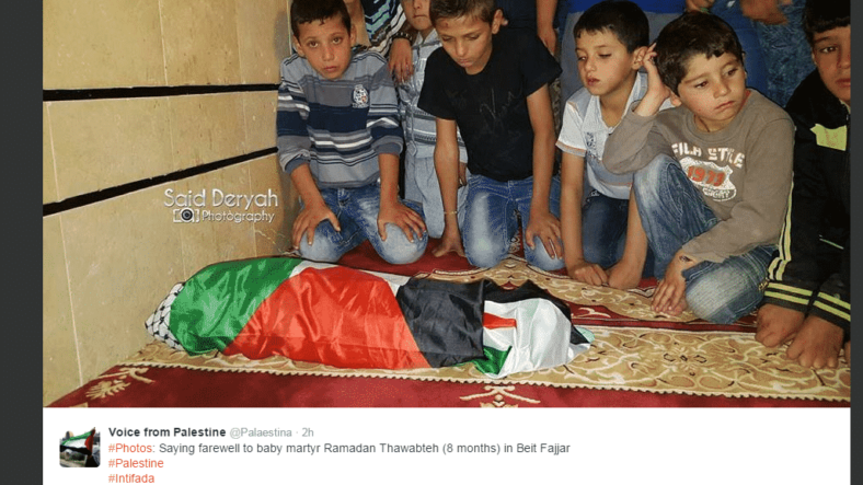 photo of Arab boys with dead baby
