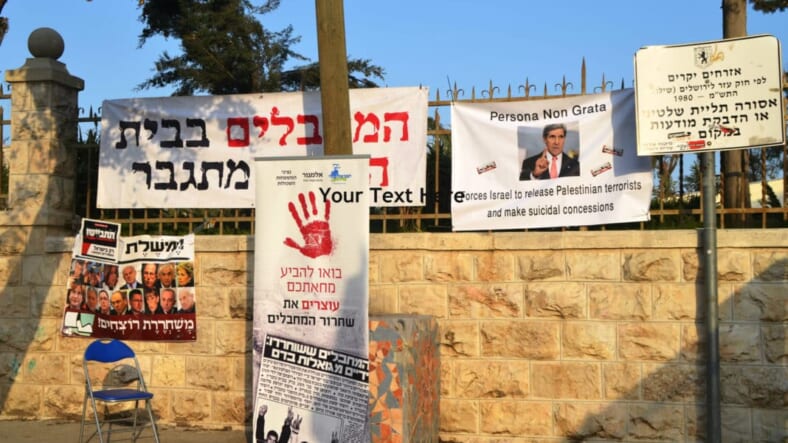 image protest signs, photo against prisoner release, picture protest signs