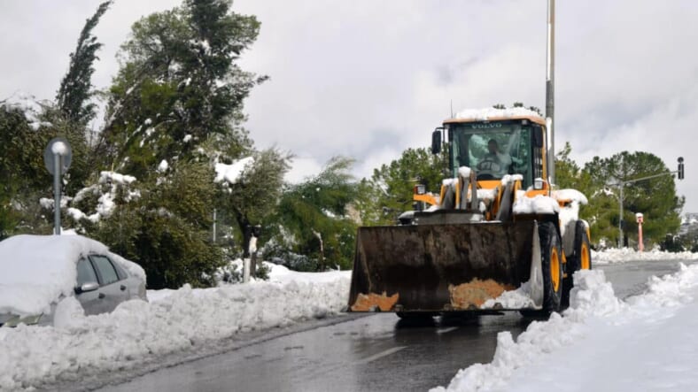 Jerusalem snow photo, plow in snow Israel , image snow in Jerusalem, Israel under snow