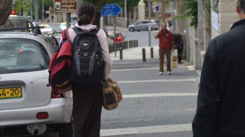 image man dressed in long skirt.