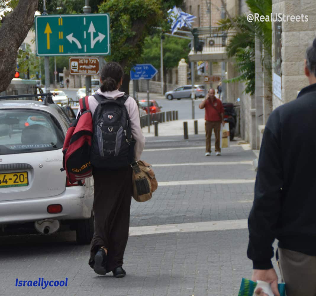 image man dressed in long skirt.