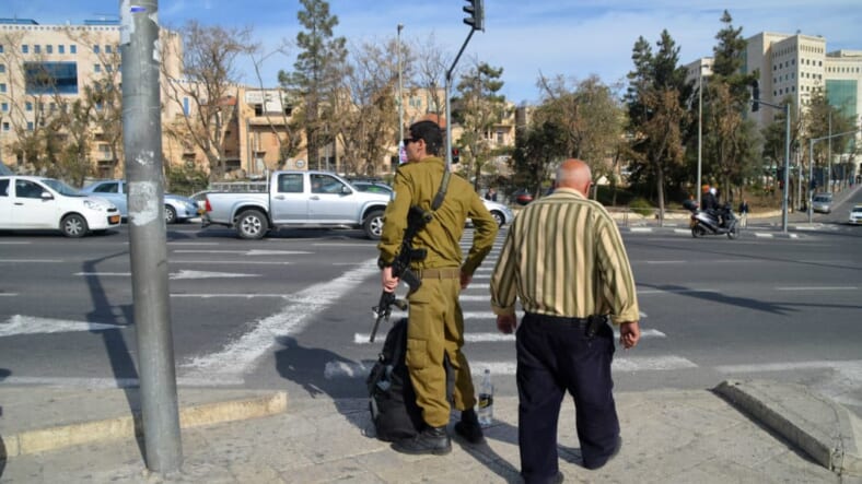image Palestinian man, Arab and Israel soldier photo, picture of armed IDF and Palestinain