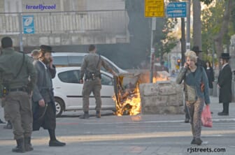 image demonstration Jerusalem, photo burning trash bin, picture fire