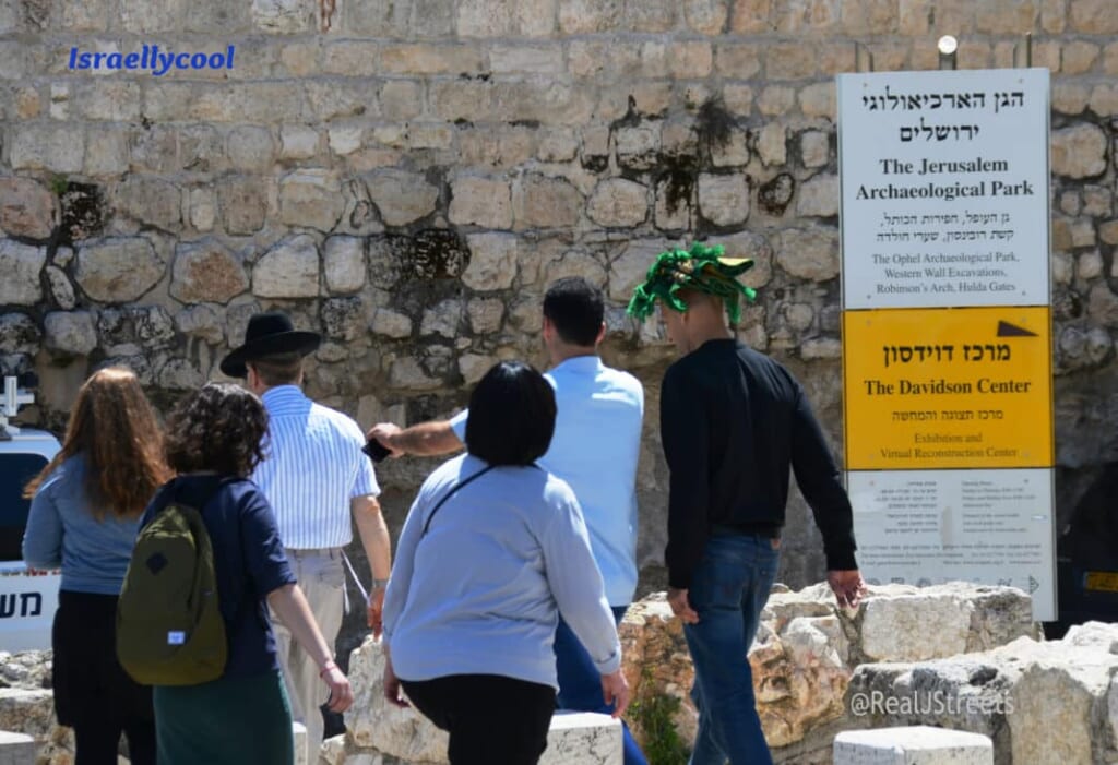 People walking near Western Wall after Friday Muslim prayers