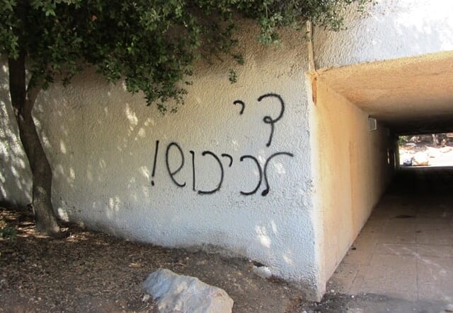 photo of graffiti near Valley of Cross end the occupation