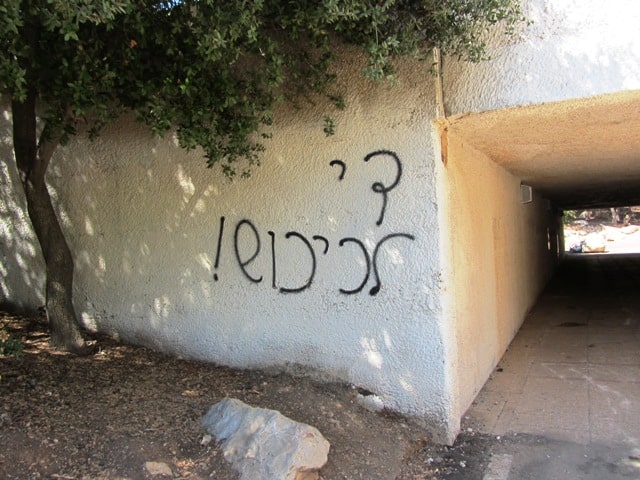 photo of graffiti near Valley of Cross end the occupation