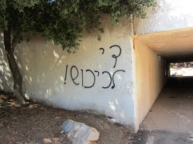 photo of graffiti near Valley of Cross end the occupation
