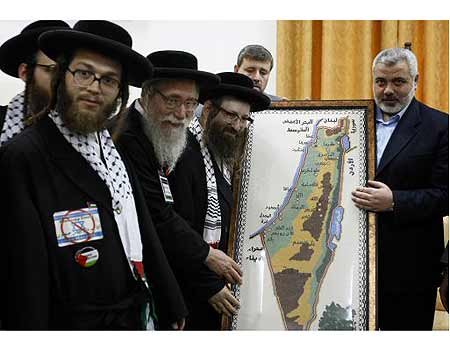 Posing for a photo opp with Ismail Haniyeh, senior political leader of Hamas and the elected PM of the PA.
