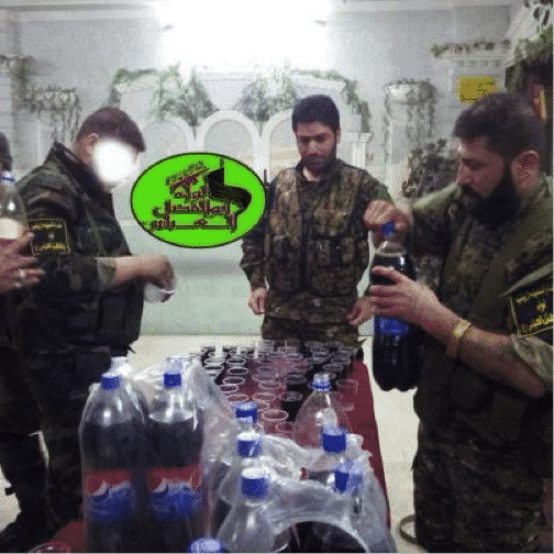 Abu ‘Ajeeb and other LAFA militants drinking Pepsi